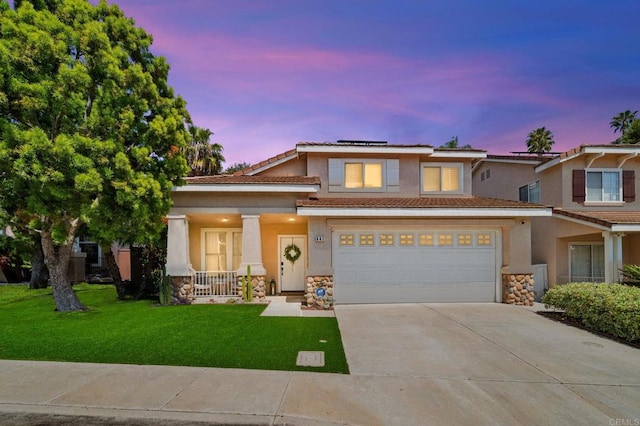 641 Hillhaven Dr, San Marcos, CA 92078 - view of front of property with covered porch, stone siding, driveway, a front yard, and stucco siding