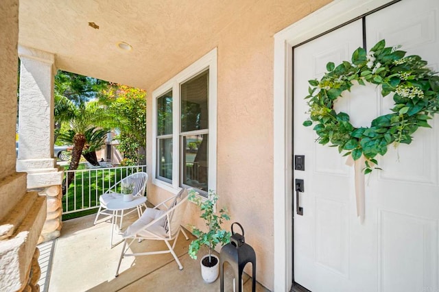 641 Hillhaven Dr, San Marcos, CA 92078 - view of exterior entry with a porch and stucco siding