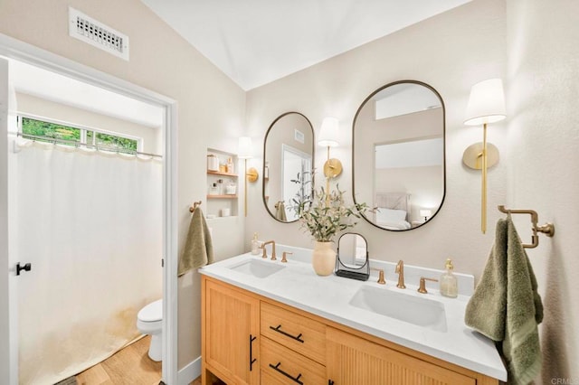 641 Hillhaven Dr, San Marcos, CA 92078 - full bathroom with wood finished floors and double vanity