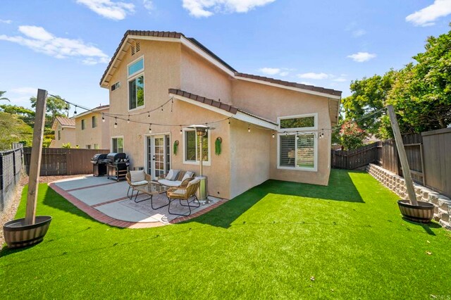 641 Hillhaven Dr, San Marcos, CA 92078 - back of property featuring stucco siding, a fenced backyard, and a patio area