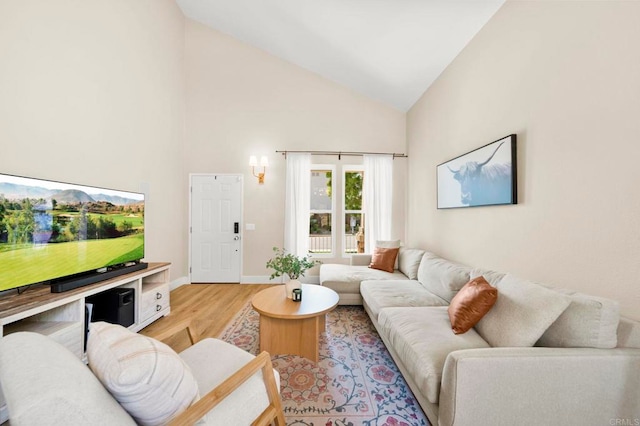 641 Hillhaven Dr, San Marcos, CA 92078 - living room featuring high vaulted ceiling and light wood finished floors