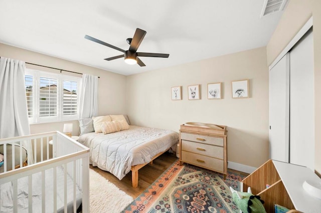 641 Hillhaven Dr, San Marcos, CA 92078 - bedroom featuring wood finished floors, a closet, and a ceiling fan