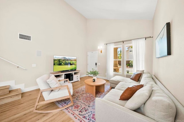 641 Hillhaven Dr, San Marcos, CA 92078 - living room with high vaulted ceiling, wood finished floors, and stairway