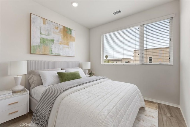 10648 Paramount Blvd, Downey, CA 90241 - bedroom featuring light wood-style flooring and recessed lighting