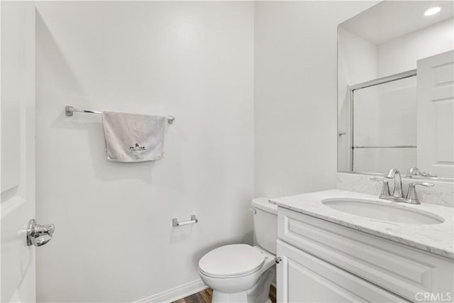 10648 Paramount Blvd, Downey, CA 90241 - full bath featuring vanity, a shower with shower door, and wood finished floors