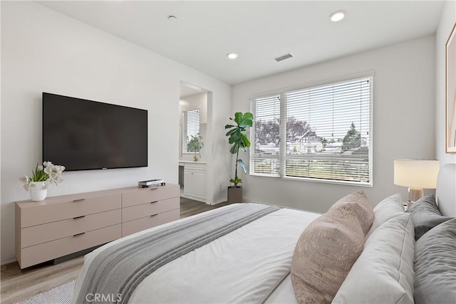 10648 Paramount Blvd, Downey, CA 90241 - bedroom featuring light wood-type flooring and recessed lighting