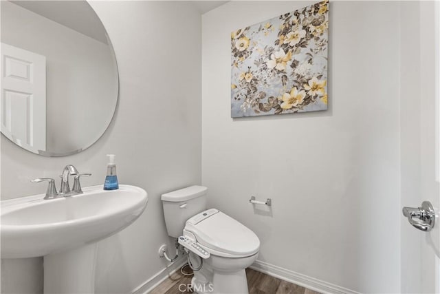 10648 Paramount Blvd, Downey, CA 90241 - bathroom with a sink and wood finished floors