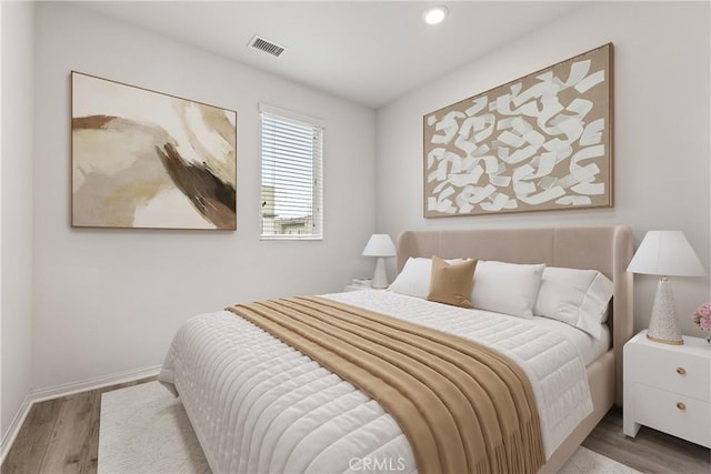 10648 Paramount Blvd, Downey, CA 90241 - bedroom featuring wood finished floors and recessed lighting