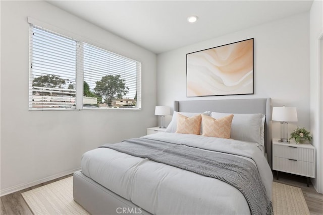 10648 Paramount Blvd, Downey, CA 90241 - bedroom featuring wood finished floors and recessed lighting