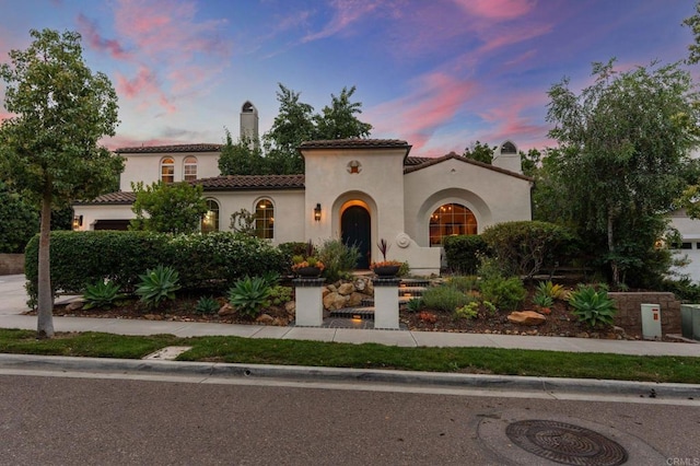7691 Circulo Sequoia, Carlsbad, CA 92009 - mediterranean / spanish house with stucco siding, a chimney, and a tiled roof