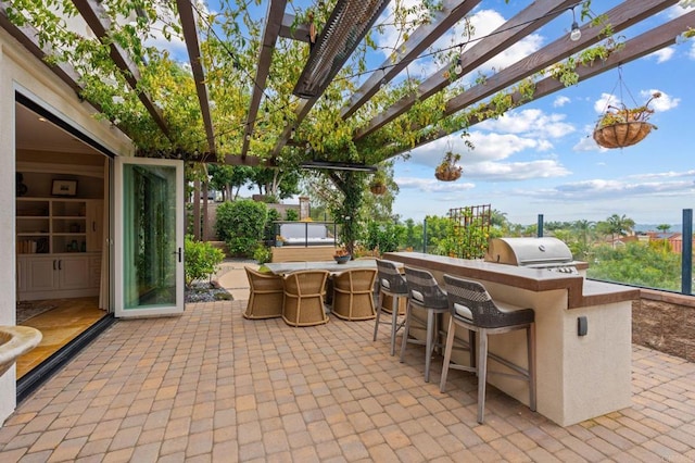 7691 Circulo Sequoia, Carlsbad, CA 92009 - view of patio featuring exterior kitchen, a pergola, and exterior bar