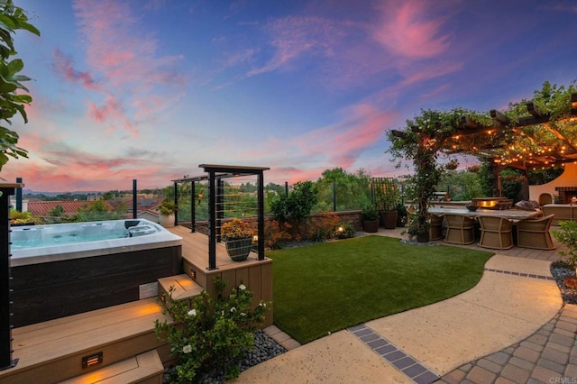 7691 Circulo Sequoia, Carlsbad, CA 92009 - yard at dusk with a hot tub, a fenced backyard, and a patio