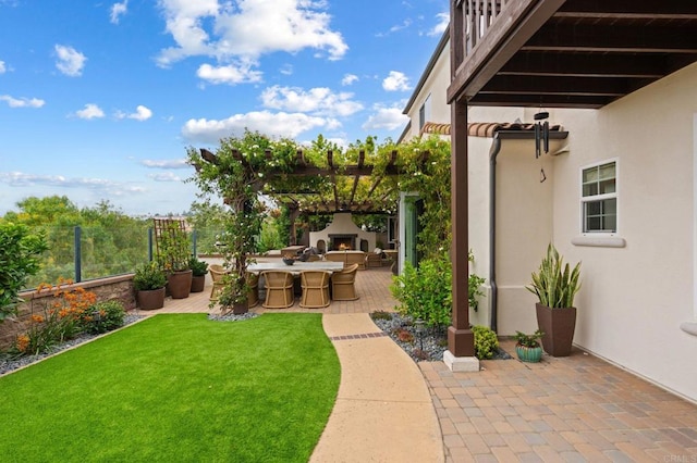 7691 Circulo Sequoia, Carlsbad, CA 92009 - view of yard with a warm lit fireplace and a patio area