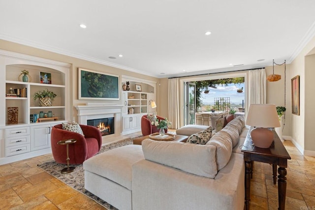 7691 Circulo Sequoia, Carlsbad, CA 92009 - living area with crown molding, stone tile flooring, a glass covered fireplace, built in shelves, and recessed lighting