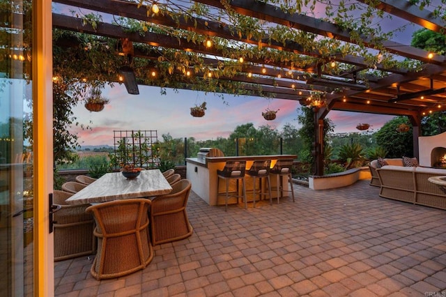 7691 Circulo Sequoia, Carlsbad, CA 92009 - patio terrace at dusk featuring a patio area and a pergola