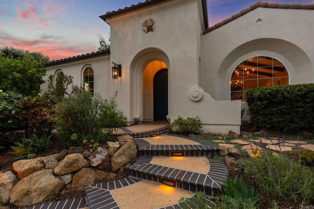 7691 Circulo Sequoia, Carlsbad, CA 92009 - property entrance with stucco siding and a tiled roof