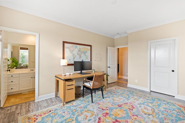 7691 Circulo Sequoia, Carlsbad, CA 92009 - home office featuring light wood-style flooring and ornamental molding