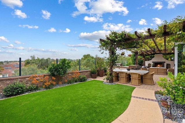 7691 Circulo Sequoia, Carlsbad, CA 92009 - view of yard with a warm lit fireplace, a patio, and a pergola
