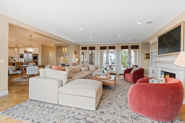 7691 Circulo Sequoia, Carlsbad, CA 92009 - living area with ornamental molding, a glass covered fireplace, recessed lighting, and built in features