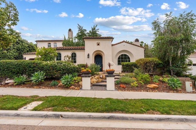 7691 Circulo Sequoia, Carlsbad, CA 92009 - mediterranean / spanish-style house with stucco siding and a tiled roof