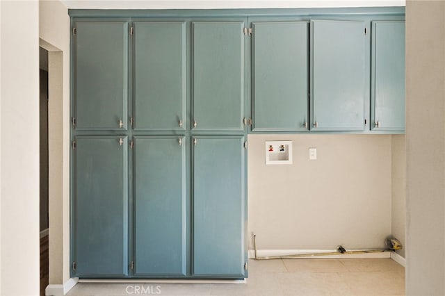 2406 S Pacific Ave, Santa Ana, CA 92704 - washroom with cabinet space and hookup for a washing machine