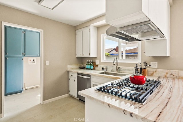 2406 S Pacific Ave, Santa Ana, CA 92704 - kitchen with appliances with stainless steel finishes, custom exhaust hood, light countertops, white cabinetry, and light tile patterned flooring