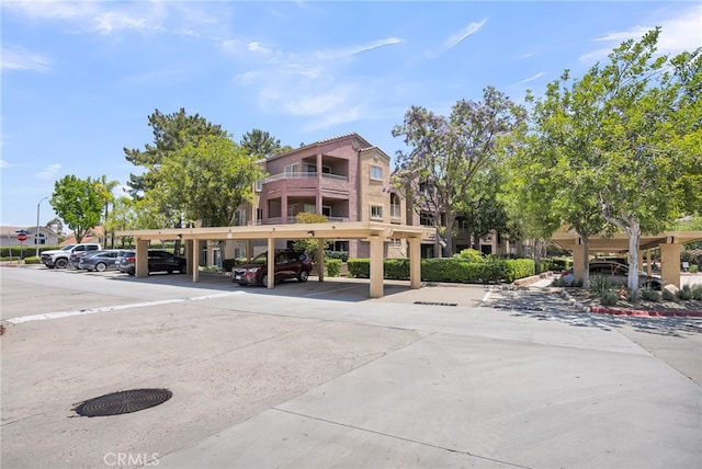 2275 Del Mar Way Unit 307, Corona, CA 92882 - view of property with covered parking