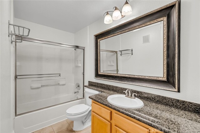 2275 Del Mar Way Unit 307, Corona, CA 92882 - full bath featuring vanity, tile patterned floors, and combined bath / shower with glass door