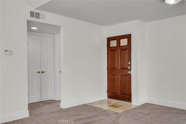 2275 Del Mar Way Unit 307, Corona, CA 92882 - foyer featuring light carpet and baseboards