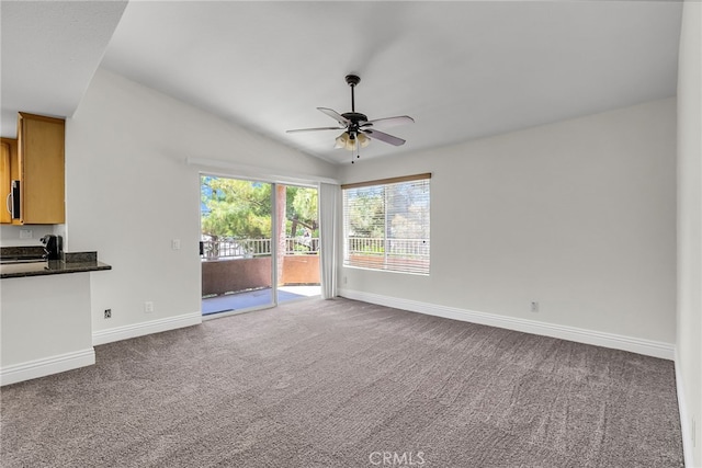 2275 Del Mar Way Unit 307, Corona, CA 92882 - unfurnished living room featuring a ceiling fan and carpet floors