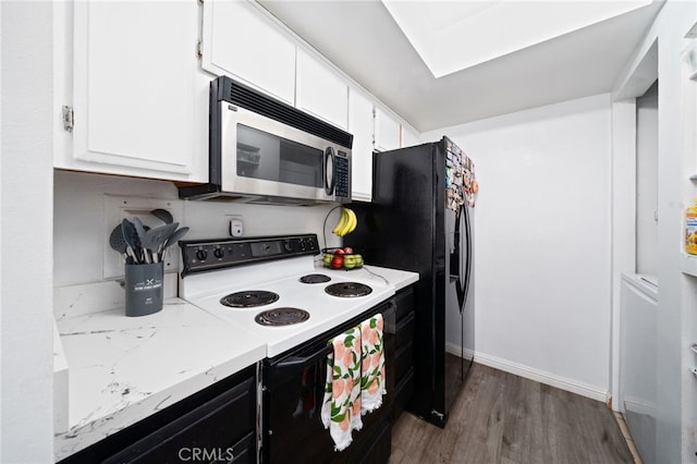 3051 Knollwood Ave, La Verne, CA 91750 - kitchen featuring stainless steel microwave, range with electric cooktop, dark wood-style floors, and white cabinets