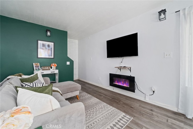 3051 Knollwood Ave, La Verne, CA 91750 - living area with a glass covered fireplace and wood finished floors