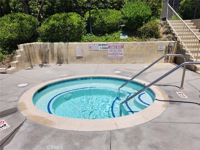 22840 Hilton Head Unit 129, Diamond Bar, CA 91765 - view of pool featuring stairs, a hot tub, and a pool