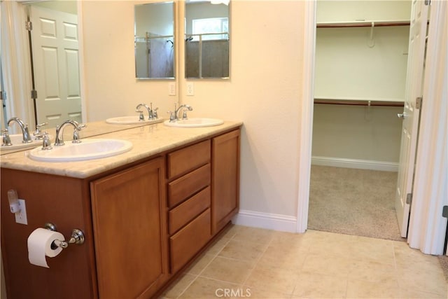1573 Maple Valley St, Manteca, CA 95336 - full bath featuring double vanity and tile patterned floors