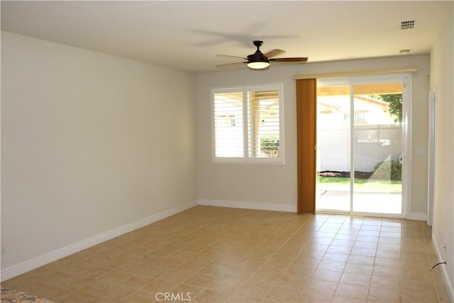 1573 Maple Valley St, Manteca, CA 95336 - spare room with ceiling fan and light tile patterned floors