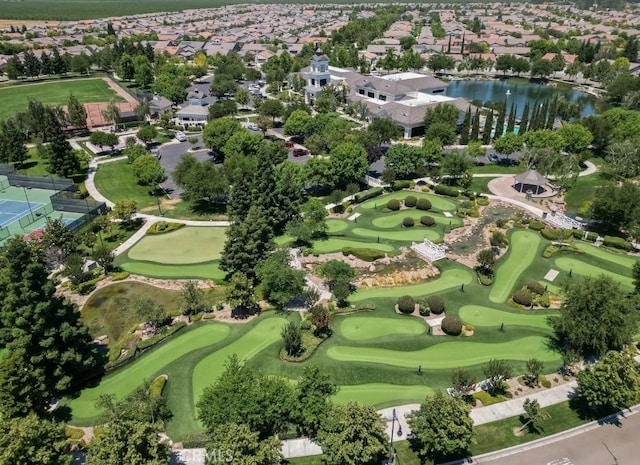 1573 Maple Valley St, Manteca, CA 95336 - aerial view of property and surrounding area featuring a local golf course, a large body of water, and nearby suburban area