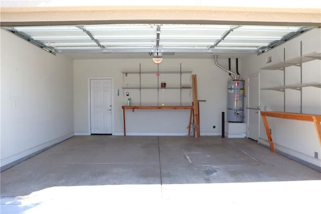 1573 Maple Valley St, Manteca, CA 95336 - garage featuring secured water heater and a garage door opener