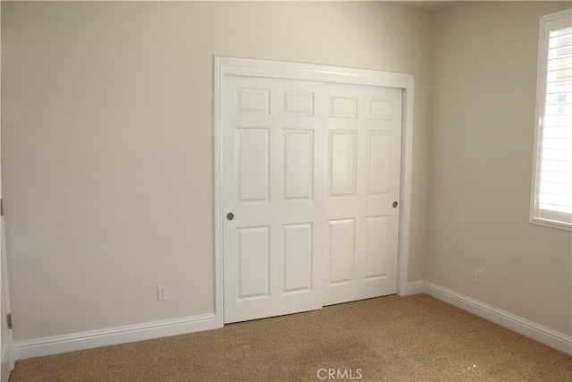 1573 Maple Valley St, Manteca, CA 95336 - unfurnished bedroom featuring carpet floors and a closet