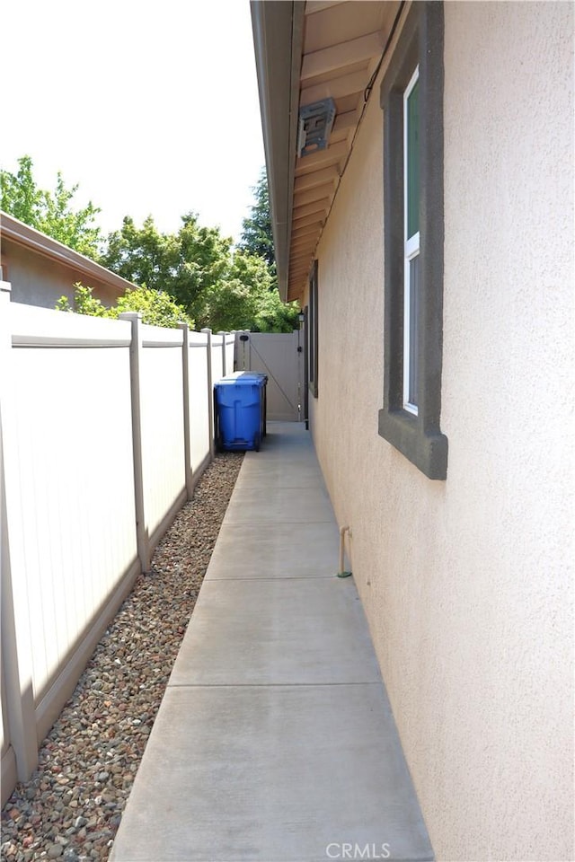 1573 Maple Valley St, Manteca, CA 95336 - view of side of property with stucco siding