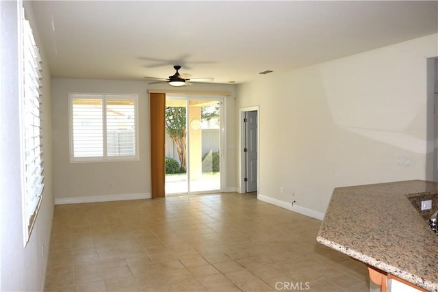 1573 Maple Valley St, Manteca, CA 95336 - unfurnished room with ceiling fan and baseboards