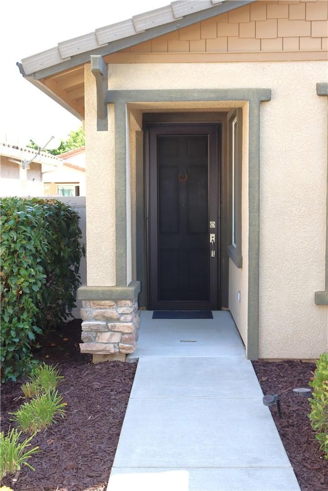 1573 Maple Valley St, Manteca, CA 95336 - entrance to property featuring stucco siding