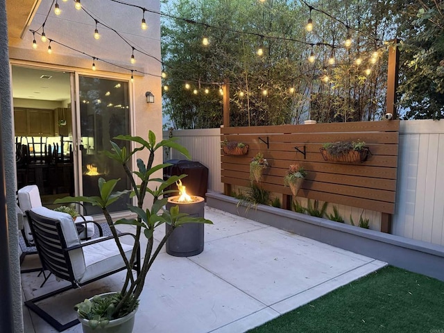 140 Unity Ln, San Marcos, CA 92078 - view of patio with an outdoor fire pit
