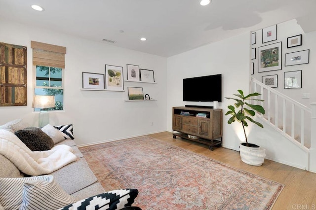 140 Unity Ln, San Marcos, CA 92078 - living room featuring wood finished floors, recessed lighting, and stairway