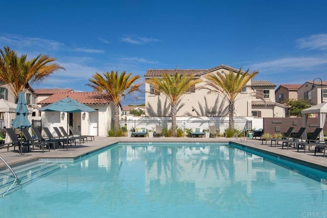 140 Unity Ln, San Marcos, CA 92078 - community pool featuring a patio and a residential view