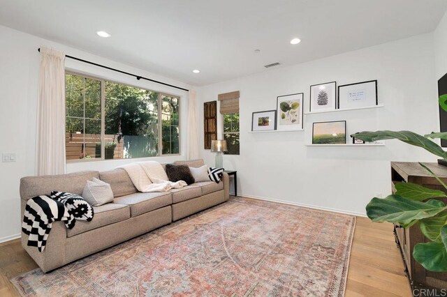 140 Unity Ln, San Marcos, CA 92078 - living area featuring wood finished floors and recessed lighting