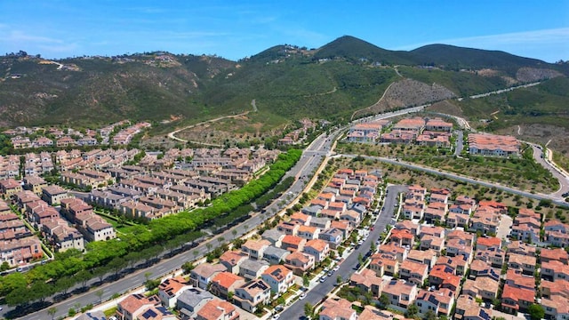 140 Unity Ln, San Marcos, CA 92078 - aerial overview of property's location with a mountainous background and nearby suburban area