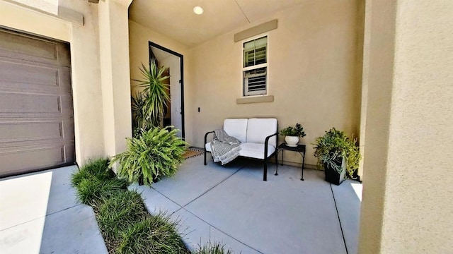 140 Unity Ln, San Marcos, CA 92078 - view of patio featuring a garage