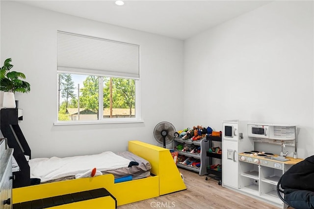 2213 De Mille Rd, Paradise, CA 95969 - bedroom with wood finished floors and recessed lighting