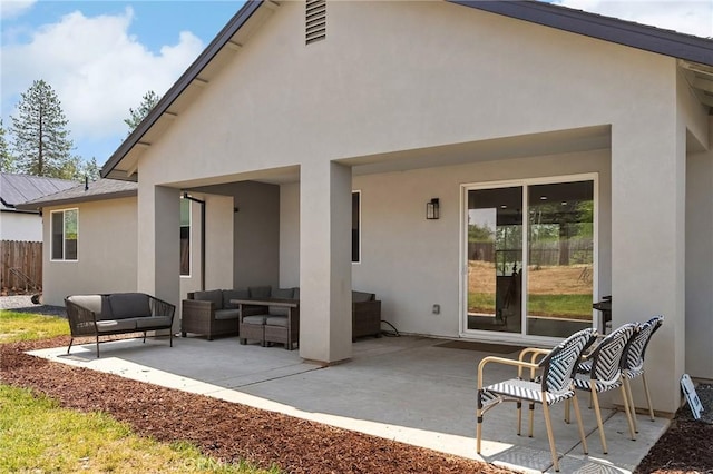 2213 De Mille Rd, Paradise, CA 95969 - rear view of property featuring an outdoor hangout area, stucco siding, and a patio area