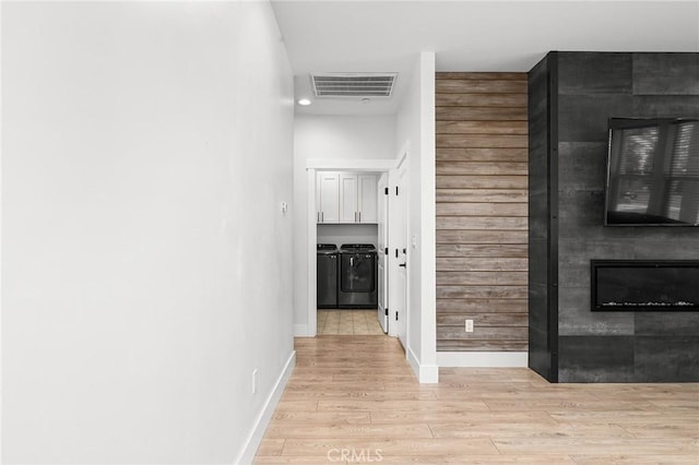 2213 De Mille Rd, Paradise, CA 95969 - corridor with washing machine and dryer, light wood-type flooring, and recessed lighting